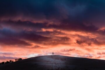 person on top of a hill
